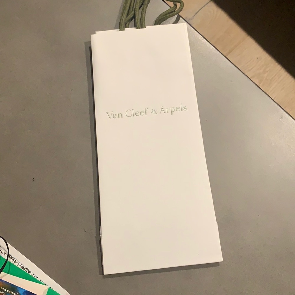 2 van cleef decorative bags